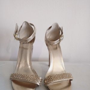 Gold stiletto size 7.5
